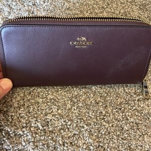 Plum colored Coach wallet